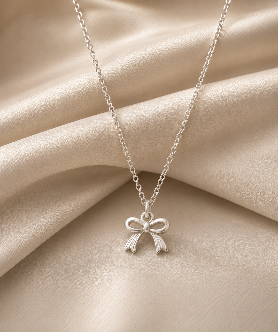 Silver Bow Pendant Necklace
